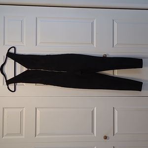 Bebe suede jumpsuit with gold zipper